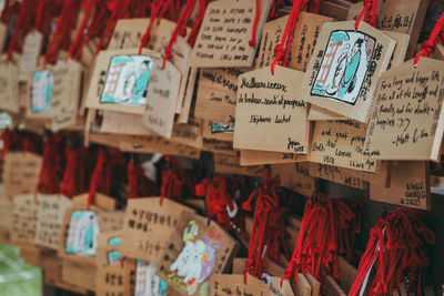 Text on religious equipment hanging outdoors