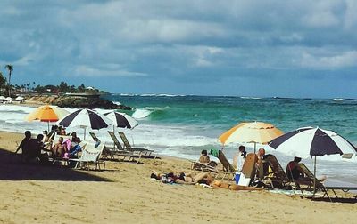 Tourists enjoying at beach