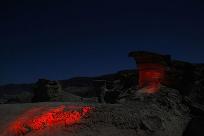 Rock formations at night