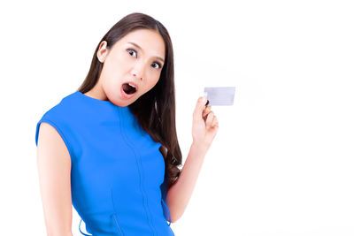 Portrait of a beautiful young woman over white background