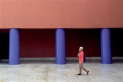 Full length of woman standing by railing