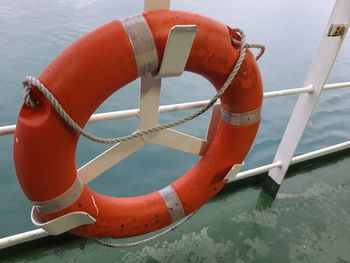 Close-up of life belt on railing at boat