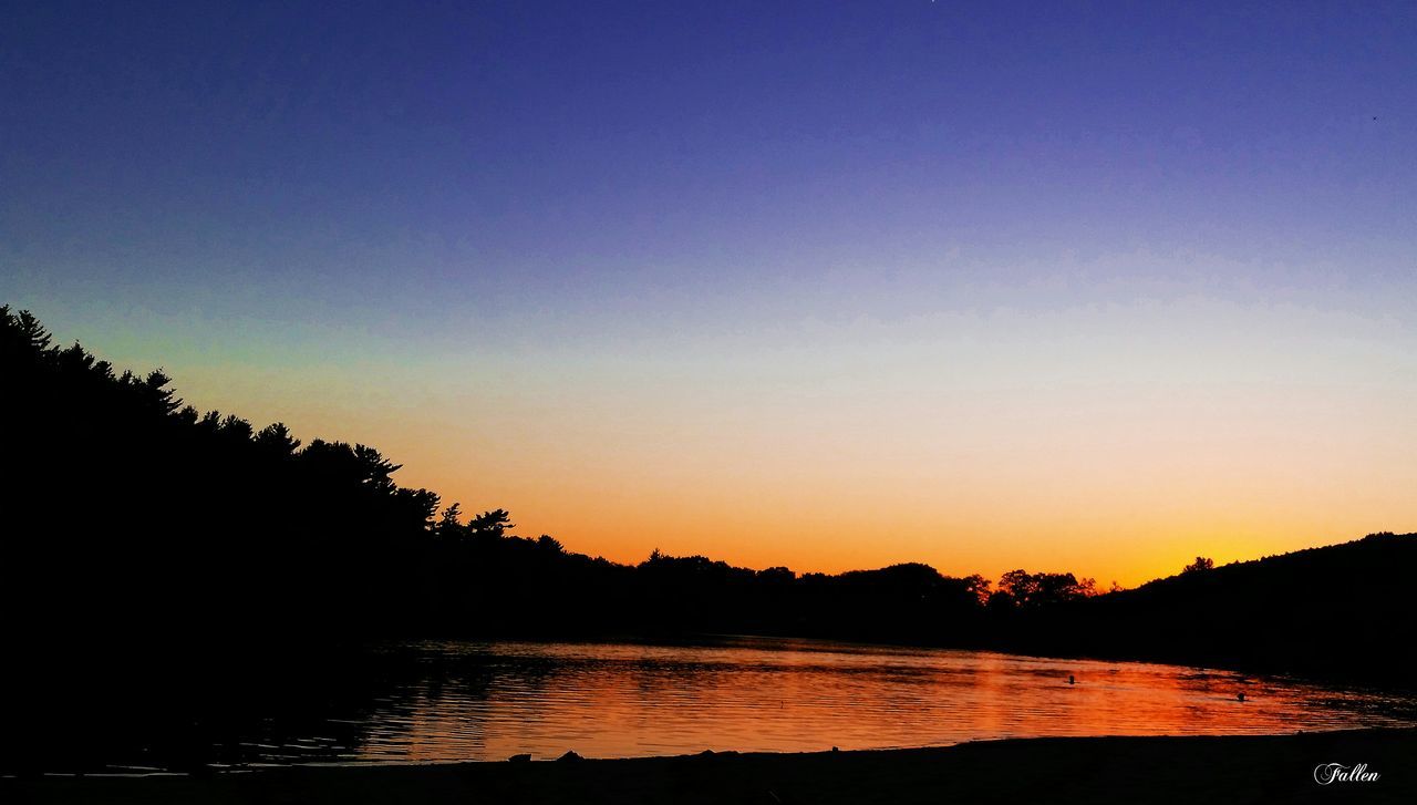 SUNSET OVER CALM SEA