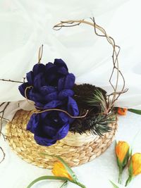 Close-up of rose in basket