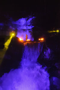 People enjoying illuminated at night