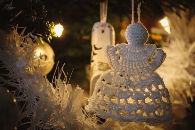 Close-up of decoration hanging at night