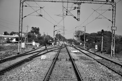 Railway tracks against clear sky