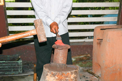 Man working on wood