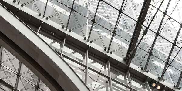 Low angle view of modern glass building