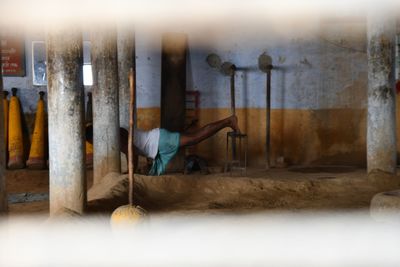 Man working by window in building