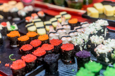 Close-up of multi colored candies for sale