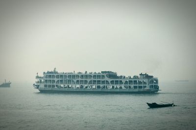 Nautical vessel on sea against sky