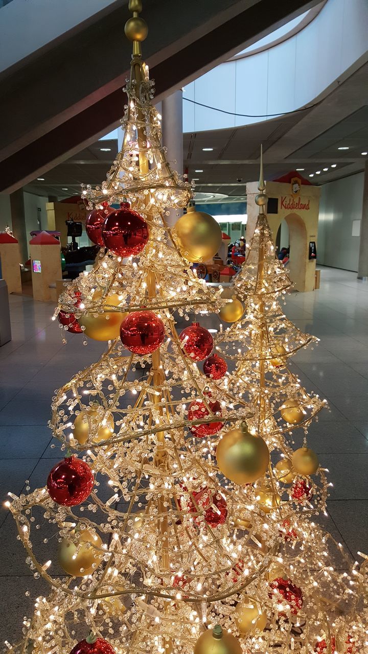 ILLUMINATED CHRISTMAS TREE AT NIGHT DURING FESTIVAL