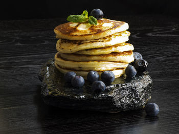 Close-up of pancakes on table