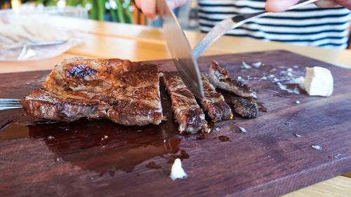 Close-up of meat on barbecue grill