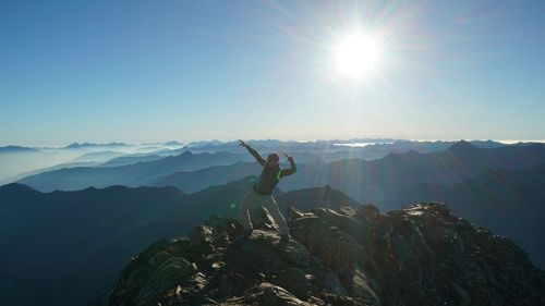 Scenic view of mountains against clear blue sky