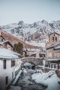 Scenic view of snowcapped mountains against clear sky