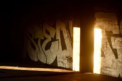 Graffiti on wall of old building