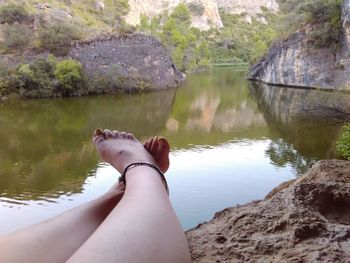 Low section of woman in lake