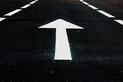 High angle view of road sign on street