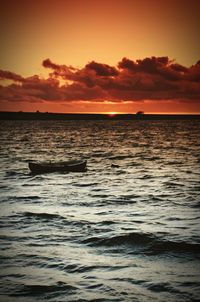 Scenic view of sea at sunset