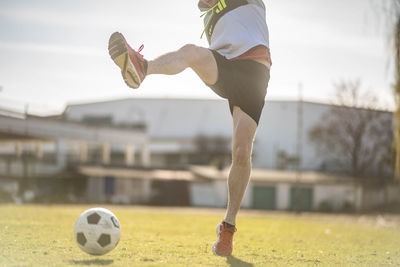 Man playing soccer ball