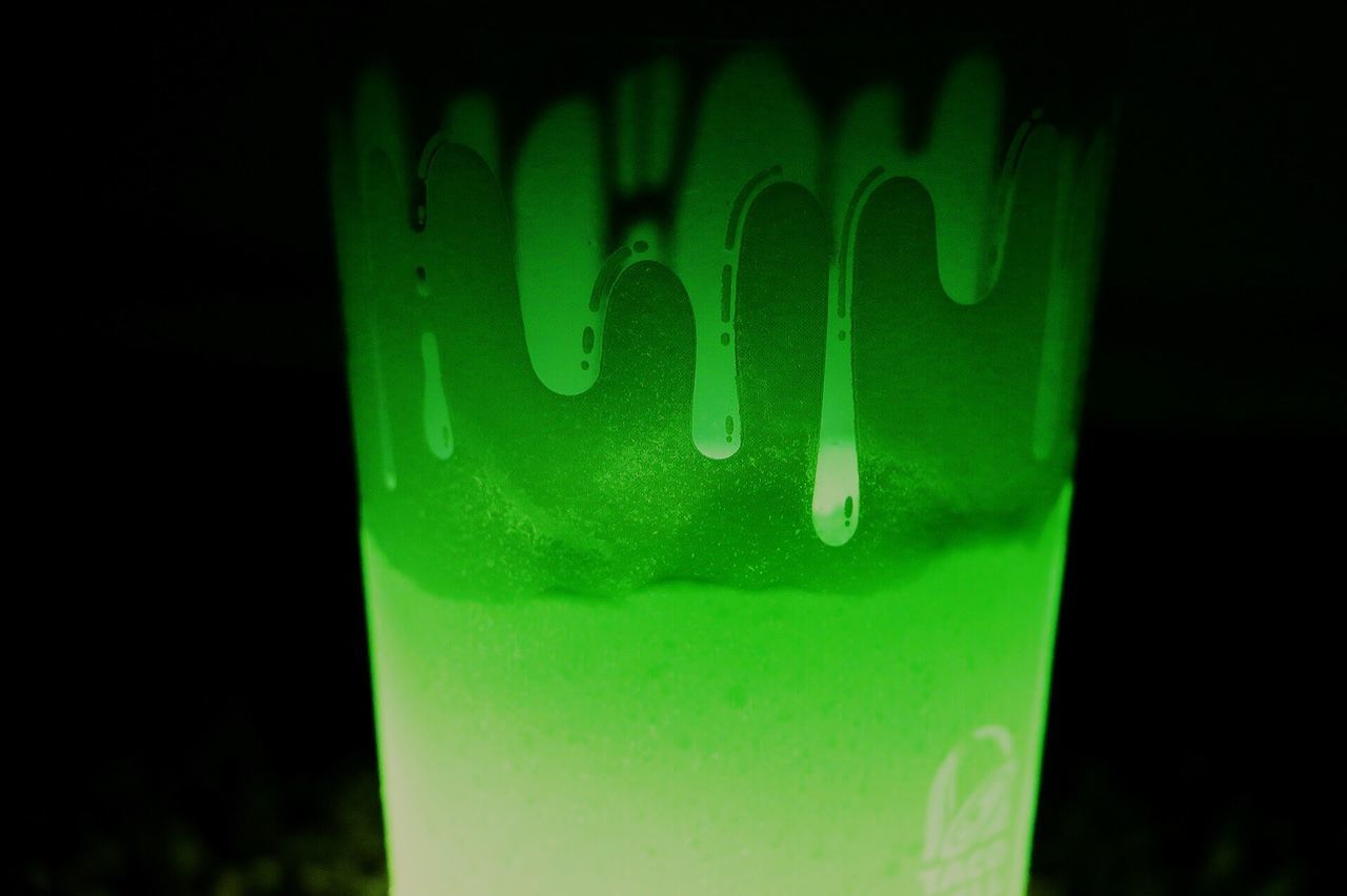 CLOSE-UP OF TEXT ON GREEN DRINK