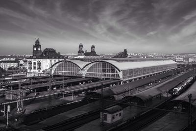 Bridge over river with city in background