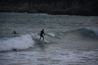 Man surfing in sea