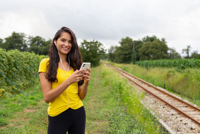 Young woman using mobile phone