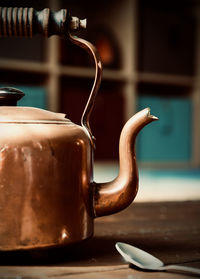 Close-up of coffee cup on table