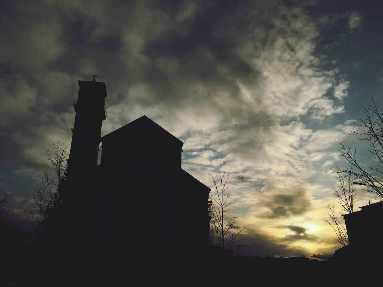 LOW ANGLE VIEW OF SILHOUETTE STRUCTURE AGAINST SKY