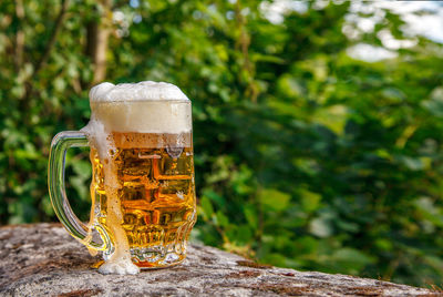 Close-up of beer glass on table