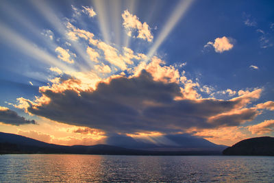 Dramatic clouds and sunbeam at lake yamanaka