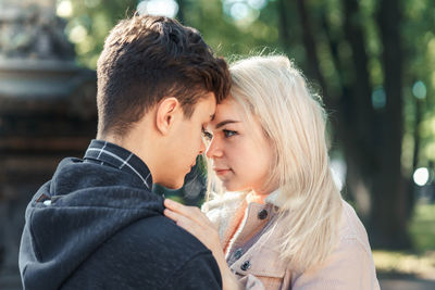 Couple romancing in park