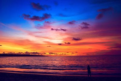 Scenic view of sea against sky at sunset