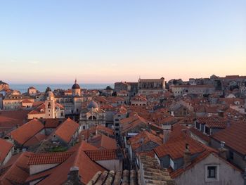 High angle view of town against sky at dusk