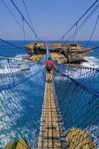 The timang beach is very unique. we have to cross the beach using a suspension bridge