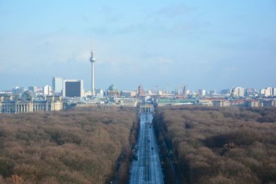 View of city buildings against sky