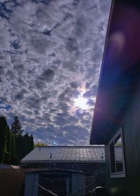 Low angle view of building against sky during sunset