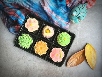 High angle view of multi colored flowers on table