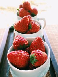 Close-up of strawberries in bowl on table