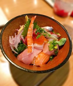 High angle view of fish in bowl on table