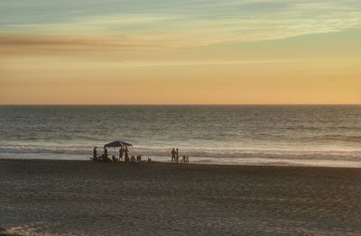Scenic view of sea at sunset