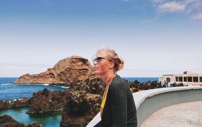 Woman standing on beach