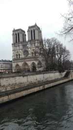 View of a river with church in background