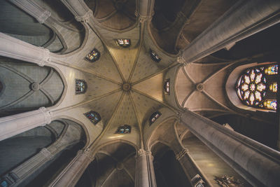 Low angle view of illuminated ceiling of building