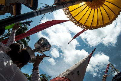 Low angle view of sculpture against sky