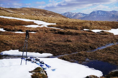 Scenic view of snow covered mountains
