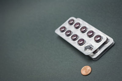 High angle view of coins on table